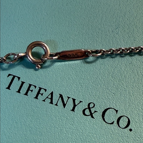 Beautiful TIFFANY & Co. 925 750 signature cross pendant necklace
